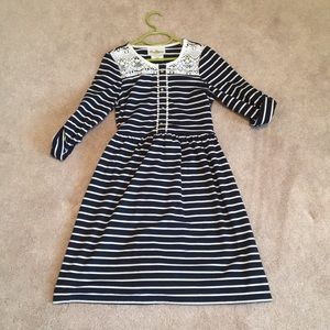 girl’s navy and white striped dress